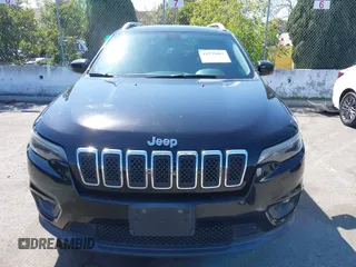 2019 Jeep Cherokee Latitude z VIN 1C4PJLCB6KD171468, wystawiony jako IAAI lot #41979097 z przebiegiem 101 991 mil mil oraz . Historia ofert i sprzedaży dostępna na DreamBid. Obrazek 13.