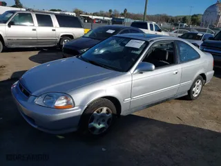 1998 Honda Civic EX with VIN 1HGEJ8145WL021907, listed as a IAAI auction lot 41759849 with 134,095 mi miles. Bid and sale history available at carsss.com. Image 2.