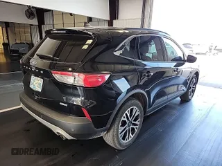 2020 Ford Escape SEL z VIN 1FMCU9H62LUB14895, wystawiony jako IAAI lot #42309833 z przebiegiem 83 487 mil mil oraz . Historia ofert i sprzedaży dostępna na DreamBid. Obrazek 1.