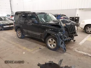 2012 Jeep Liberty Sport z VIN 1C4PJMAK7CW162065, wystawiony jako IAAI lot #41658239 z przebiegiem 180 565 mil mil oraz . Historia ofert i sprzedaży dostępna na DreamBid. Obrazek 1.