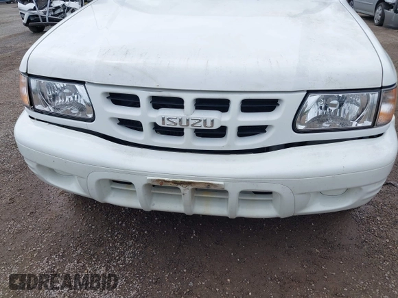 2000 Isuzu Rodeo z VIN 4S2DM58W6Y4312571, wystawiony jako IAAI lot #42253955 z przebiegiem 84 517 mil mil oraz . Historia ofert i sprzedaży dostępna na DreamBid. Obrazek 6.