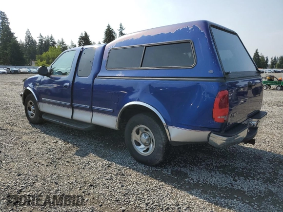1998 Ford F-150 with VIN 1FTZX1765WKA33379, listed as a Copart auction lot 62009135 with 152,607 mi miles and Salvage title. Bid and sale history available at DreamBid. Image 2.