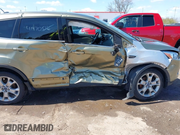 2013 Ford Escape SEL with VIN 1FMCU0HX1DUD51254, listed as a IAAI auction lot 41970516 with 83,616 mi miles. Bid and sale history available at carsss.com. Image 6.