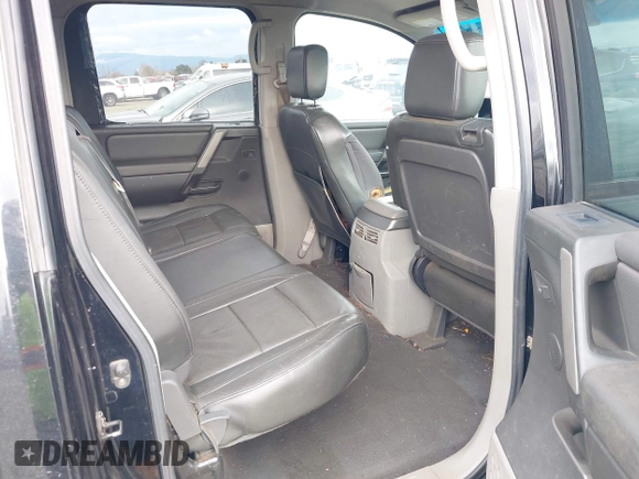 2004 Nissan Titan LE with VIN 1N6AA07A24N549589, listed as a IAAI auction lot 41750807 with 218,118 mi miles and . Bid and sale history available at DreamBid. Image 8.
