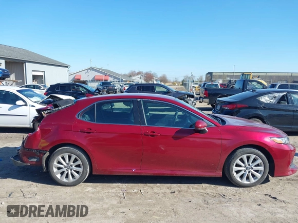 2019 Toyota Camry LE with VIN 4T1B11HK1KU233345, listed as a IAAI auction lot 41971136 with 51,499 mi miles and . Bid and sale history available at DreamBid. Image 14.