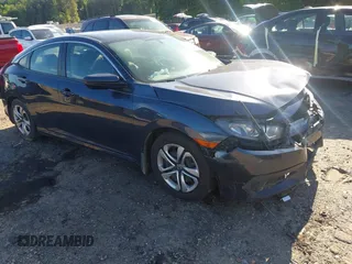 2017 Honda Civic LX with VIN 19XFC2F59HE205948, listed as a IAAI auction lot 42501439 with 130,284 mi miles and . Bid and sale history available at DreamBid. Image 1.