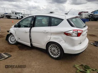 2016 Ford C-Max Energi SEL with VIN 1FADP5CU0GL115513, listed as a Copart auction lot 54078984 with 105,319 mi miles and Salvage Title. Bid and sale history available at carsss.com. Image 2.