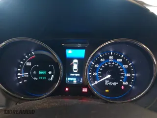 2014 Hyundai Sonata Hybrid with VIN KMHEC4A4XEA113716, listed as a IAAI auction lot 40488884 with 154,548 mi miles. Bid and sale history available at carsss.com. Image 7.