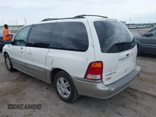2003 Ford Windstar SEL with VIN 2FMZA53423BA93926, listed as a IAAI auction lot 42537144 with 131,149 mi miles and . Bid and sale history available at DreamBid. Image 3.