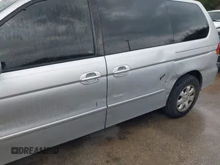 2004 Honda Odyssey EX with VIN 5FNRL18694B076305, listed as a IAAI auction lot 41929212 with 287,717 mi miles and . Bid and sale history available at DreamBid. Image 6.