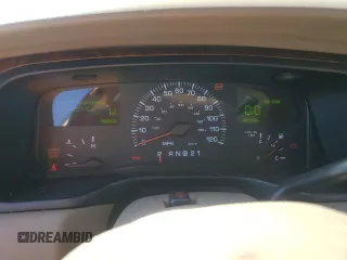 2001 Lincoln Town Car Cartier z VIN 1LNHM83W31Y671814, wystawiony jako Copart lot #77169664 z przebiegiem Nie podano mil oraz Szkoda całkowita • Salvage title. Historia ofert i sprzedaży dostępna na DreamBid. Obrazek 9.