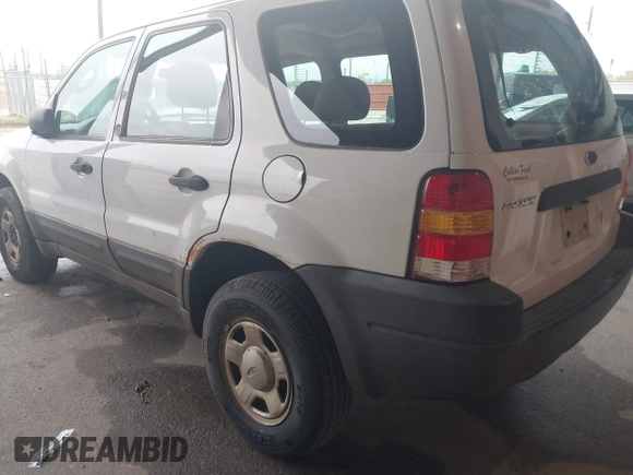 2004 Ford Escape XLS with VIN 1FMYU02134DA08567, listed as a IAAI auction lot 41872076 with 239,602 mi miles and . Bid and sale history available at DreamBid. Image 3.