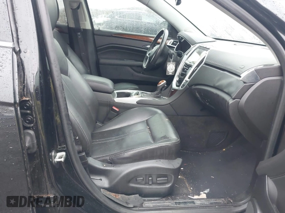 2016 Cadillac SRX Luxury Collection with VIN 3GYFNEE33GS561222, listed as a IAAI auction lot 42012531 with 82,324 mi miles. Bid and sale history available at carsss.com. Image 5.