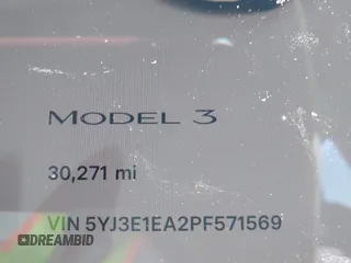 2023 Tesla Model 3 with VIN 5YJ3E1EA2PF571569, listed as a IAAI auction lot 42288715 with 30,271 mi miles and . Bid and sale history available at DreamBid. Image 15.