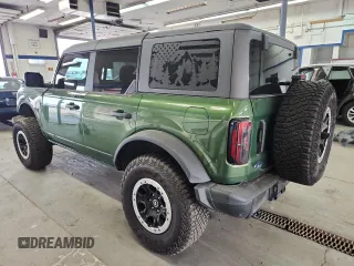 2023 Ford Bronco z VIN 1FMEE5DP9PLB54433, wystawiony jako Copart lot #60074335 z przebiegiem 23 709 mil mil oraz Szkoda całkowita • Salvage title. Historia ofert i sprzedaży dostępna na DreamBid. Obrazek 2.