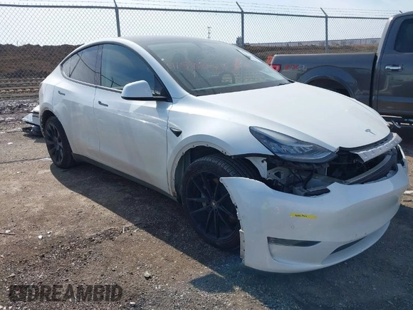 2022 Tesla Model Y Long Range with VIN 7SAYGDEE4NF428434, listed as a IAAI auction lot 41578503 with 35,460 mi miles and . Bid and sale history available at DreamBid. Image 1.