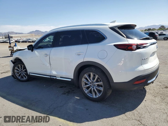 2021 Mazda CX-9 Carbon Edition с VIN JM3TCADY4M0500010, выставлен на аукционе Copart как лот 53283005 с пробегом 55 762 миль миль и Списание • Salvage title. История ставок и продаж доступна на DreamBid. Изображение 2.