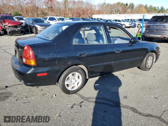 2005 Hyundai Accent GLS z VIN KMHCG45C15U662362, wystawiony jako Copart lot #80574774 z przebiegiem 122 898 mil mil oraz Szkoda całkowita • Salvage title. Historia ofert i sprzedaży dostępna na DreamBid. Obrazek 3.