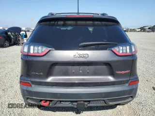 2019 Jeep Cherokee Trailhawk Elite z VIN 1C4PJMBN0KD427007, wystawiony jako Copart lot #57429735 z przebiegiem 54 070 mil mil oraz Szkoda całkowita • Salvage title. Historia ofert i sprzedaży dostępna na DreamBid. Obrazek 6.