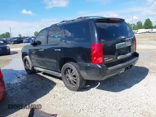 2011 GMC Yukon SLT z VIN 1GKS2CE02BR345370, wystawiony jako IAAI lot #42338653 z przebiegiem 225 000 mil mil oraz . Historia ofert i sprzedaży dostępna na DreamBid. Obrazek 3.