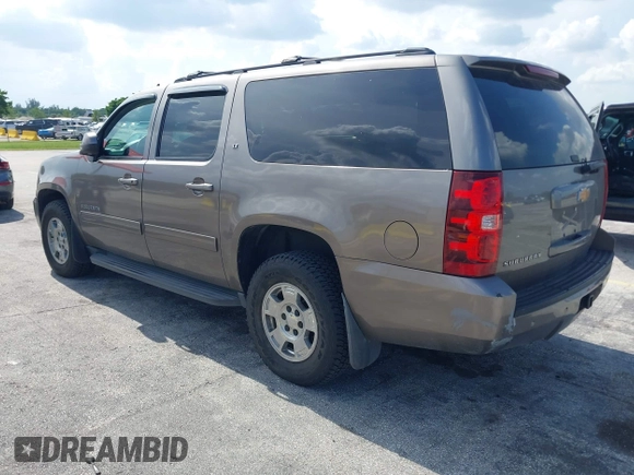 2012 Chevrolet Suburban LT with VIN 1GNSKJE72CR130111, listed as a IAAI auction lot 42699365 with 216,827 mi miles and . Bid and sale history available at DreamBid. Image 3.