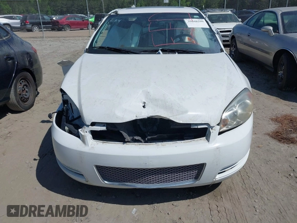2014 Chevrolet Impala LT with VIN 2G1WB5E30E1136153, listed as a IAAI auction lot 39848599 with 126,676 mi miles and . Bid and sale history available at DreamBid. Image 12.