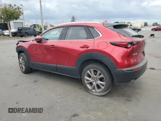2021 Mazda CX-30 Premium with VIN 3MVDMADL1MM319635, listed as a Copart auction lot 48482585 with 21,192 mi miles and Salvage title. Bid and sale history available at DreamBid. Image 2.