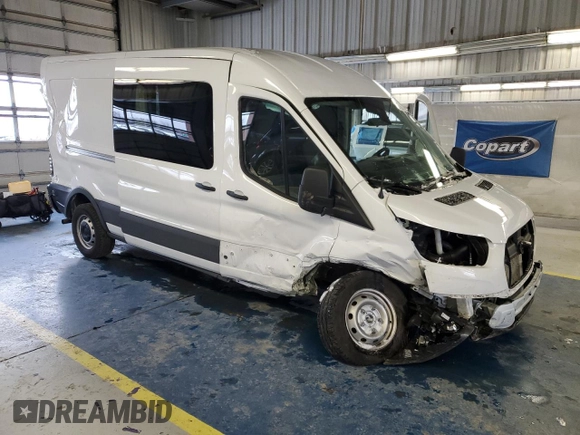 2024 Ford Transit Cargo with VIN 1FTBR1C88RKA39474, listed as a Copart auction lot 86339884 with Not Provided miles and Salvage Title. Bid and sale history available at DreamBid. Image 4.