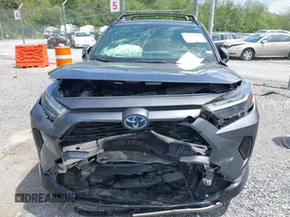 2023 Toyota RAV4 Hybrid SE with VIN JTM16RFV9PD113152, listed as a IAAI auction lot 42177056 with 41,204 mi miles and . Bid and sale history available at DreamBid. Image 11.