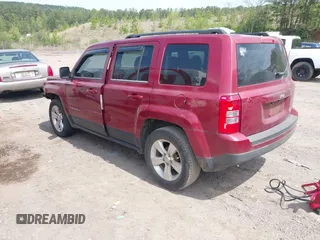 2014 Jeep Patriot Sport with VIN 1C4NJPBBXED617934, listed as a IAAI auction lot 42001839 with 117,306 mi miles. Bid and sale history available at carsss.com. Image 3.