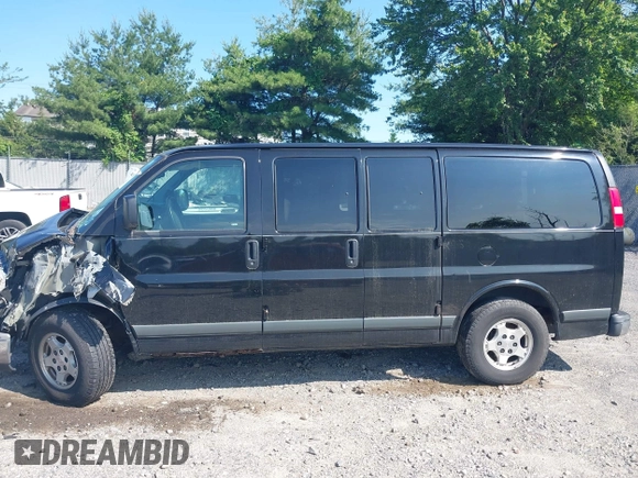 2005 Chevrolet Express Passenger z VIN 1GNFG15T751169844, wystawiony jako IAAI lot #42393893 z przebiegiem 226 673 mil mil oraz . Historia ofert i sprzedaży dostępna na DreamBid. Obrazek 14.