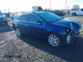 2011 Volkswagen Jetta SportWagen TDI with VIN 3VWPL7AJ8BM610859, listed as a IAAI auction lot 41092734 with 97,454 mi miles. Bid and sale history available at carsss.com. Image 1.