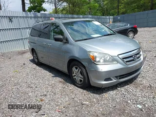 2007 Honda Odyssey EX-L z VIN 5FNRL38717B012462, wystawiony jako IAAI lot #42388885 z przebiegiem 166 861 mil mil oraz . Historia ofert i sprzedaży dostępna na DreamBid. Obrazek 1.