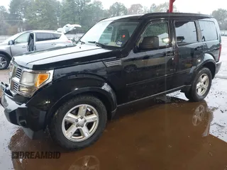 2007 Dodge Nitro SXT with VIN 1D8GT28K67W683600, listed as a IAAI auction lot 40958011 with 70,141 mi miles. Bid and sale history available at carsss.com. Image 17.