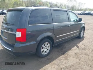 2012 Chrysler Town & Country Touring with VIN 2C4RC1BG8CR326041, listed as a IAAI auction lot 42137341 with 112,026 mi miles. Bid and sale history available at carsss.com. Image 4.