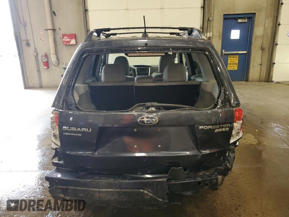2013 Subaru Forester X Premium with VIN JF2SHADC7DH435537, listed as a Copart auction lot 60250665 with 130,685 mi miles and Salvage title. Bid and sale history available at DreamBid. Image 6.
