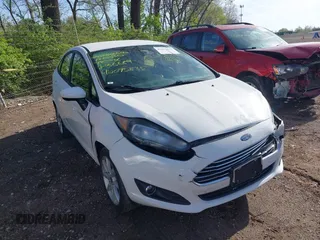 2019 Ford Fiesta SE z VIN 3FADP4BJ9KM136689, wystawiony jako IAAI lot #42095835 z przebiegiem 80 856 mil mil oraz . Historia ofert i sprzedaży dostępna na DreamBid. Obrazek 1.
