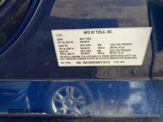 2022 Tesla Model Y Long Range with VIN 7SAYGDEE6NF318372, listed as a IAAI auction lot 41526857 with 26,083 mi miles and . Bid and sale history available at carsss.com. Image 9.
