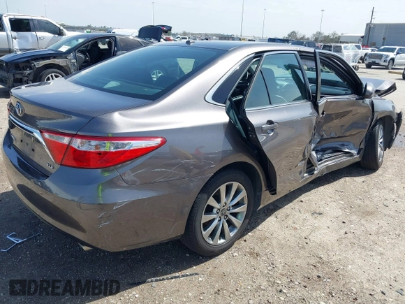 2015 Toyota Camry XLE with VIN 4T1BF1FK0FU952421, listed as a IAAI auction lot 41714622 with 125,553 mi miles and . Bid and sale history available at DreamBid. Image 4.