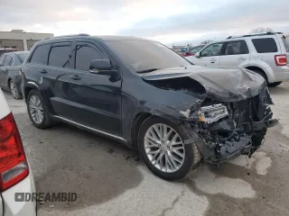 2018 Jeep Grand Cherokee Summit with VIN 1C4RJFJT2JC390079, listed as a Copart auction lot 43502555 with 106,724 mi miles and Salvage title. Bid and sale history available at DreamBid. Image 4.