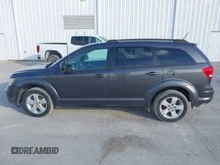 2014 Dodge Journey SE with VIN 3C4PDCAB0ET283756, listed as a IAAI auction lot 41490472 with 122,695 mi miles. Bid and sale history available at carsss.com. Image 15.