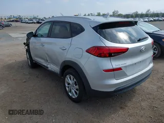 2019 Hyundai Tucson Value with VIN KM8J3CA46KU962082, listed as a IAAI auction lot 42160288 with 92,887 mi miles and . Bid and sale history available at DreamBid. Image 3.