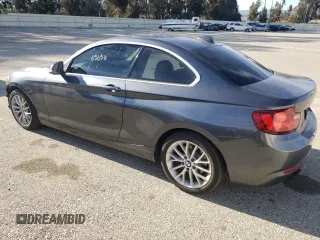 2015 BMW 2 Series 228i with VIN WBA1F5C50FV256459, listed as a Copart auction lot 56518723 with 65,653 mi miles. Bid and sale history available at carsss.com. Image 2.