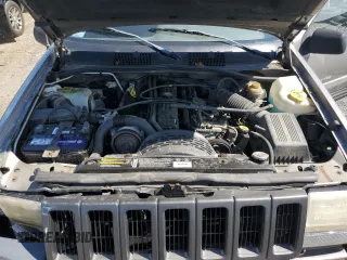1998 Jeep Grand Cherokee Laredo z VIN 1J4GZ58S4WC278490, wystawiony jako Copart lot #62388535 z przebiegiem 133 896 mil mil oraz Czysty tytuł • Clean title. Historia ofert i sprzedaży dostępna na DreamBid. Obrazek 12.
