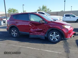 2018 Toyota RAV4 XLE with VIN JTMWFREV6JD117500, listed as a IAAI auction lot 42258588 with Not provided miles and . Bid and sale history available at DreamBid. Image 14.