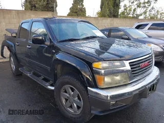 2010 GMC Canyon z VIN 1GTJSFDP6A8134412, wystawiony jako IAAI lot #41589150 z przebiegiem 164 232 mil mil oraz . Historia ofert i sprzedaży dostępna na DreamBid. Obrazek 1.