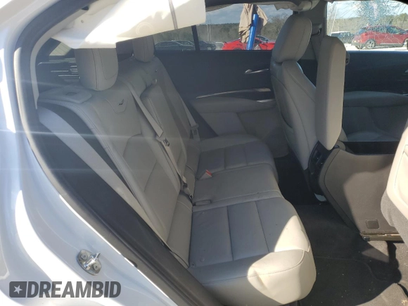 2022 Cadillac XT4 FWD Premium Luxury with VIN 1GYFZCR45NF100049, listed as a Copart auction lot 87232634 with 62,391 mi miles and Salvage title. Bid and sale history available at DreamBid. Image 12.