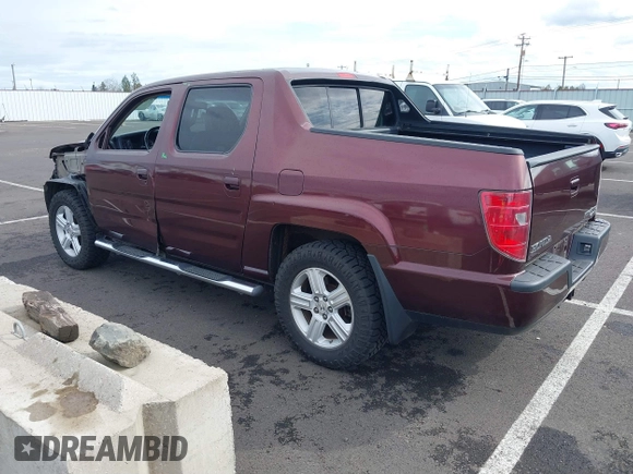 2009 Honda Ridgeline RTL with VIN 5FPYK16539B101836, listed as a IAAI auction lot 41894409 with 185,325 mi miles. Bid and sale history available at carsss.com. Image 3.
