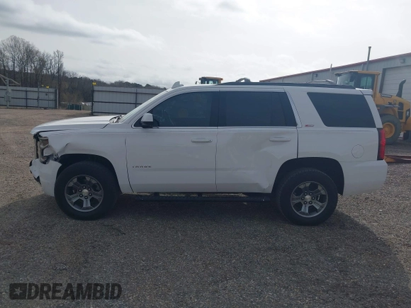 2017 Chevrolet Tahoe LT with VIN 1GNSKBKCXHR350028, listed as a IAAI auction lot 41684954 with 117,261 mi miles and . Bid and sale history available at DreamBid. Image 15.