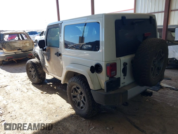 2015 Jeep Wrangler Altitude z VIN 1C4GJWBG2FL714146, wystawiony jako IAAI lot #41417659 z przebiegiem Nie podano mil oraz . Historia ofert i sprzedaży dostępna na DreamBid. Obrazek 3.
